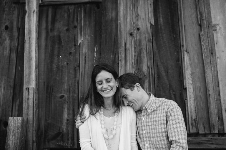 couple laughing at china camp engagement session in marin