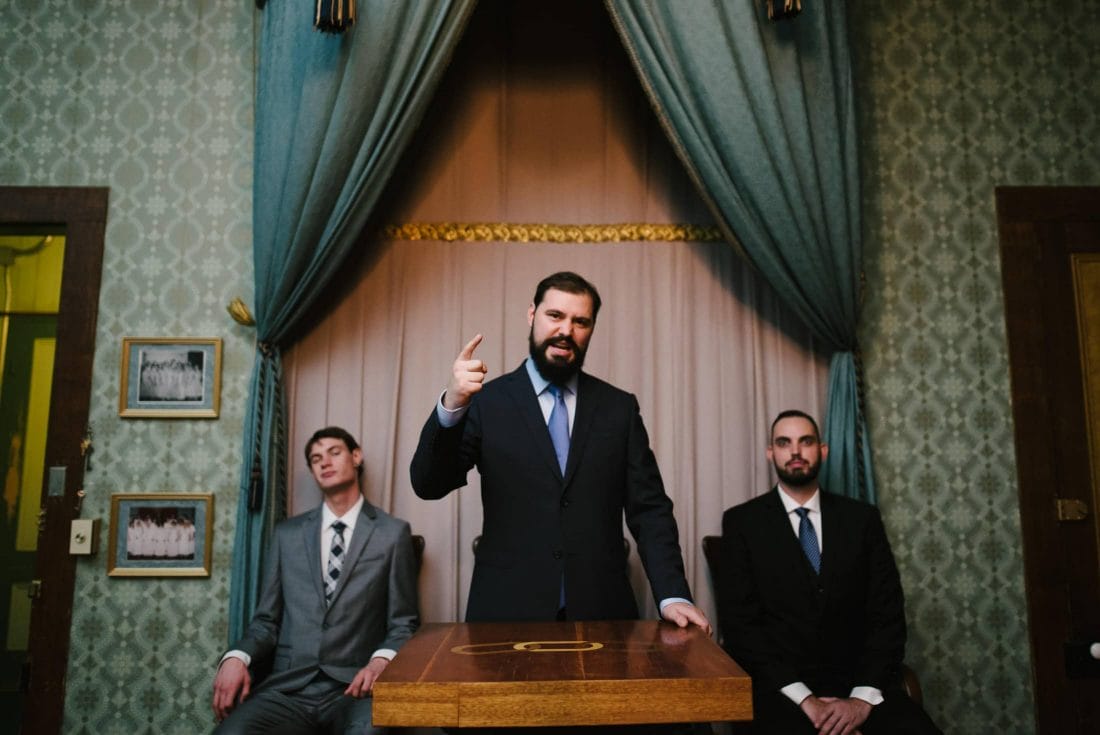 unique pic of groom at wedding in forest hill