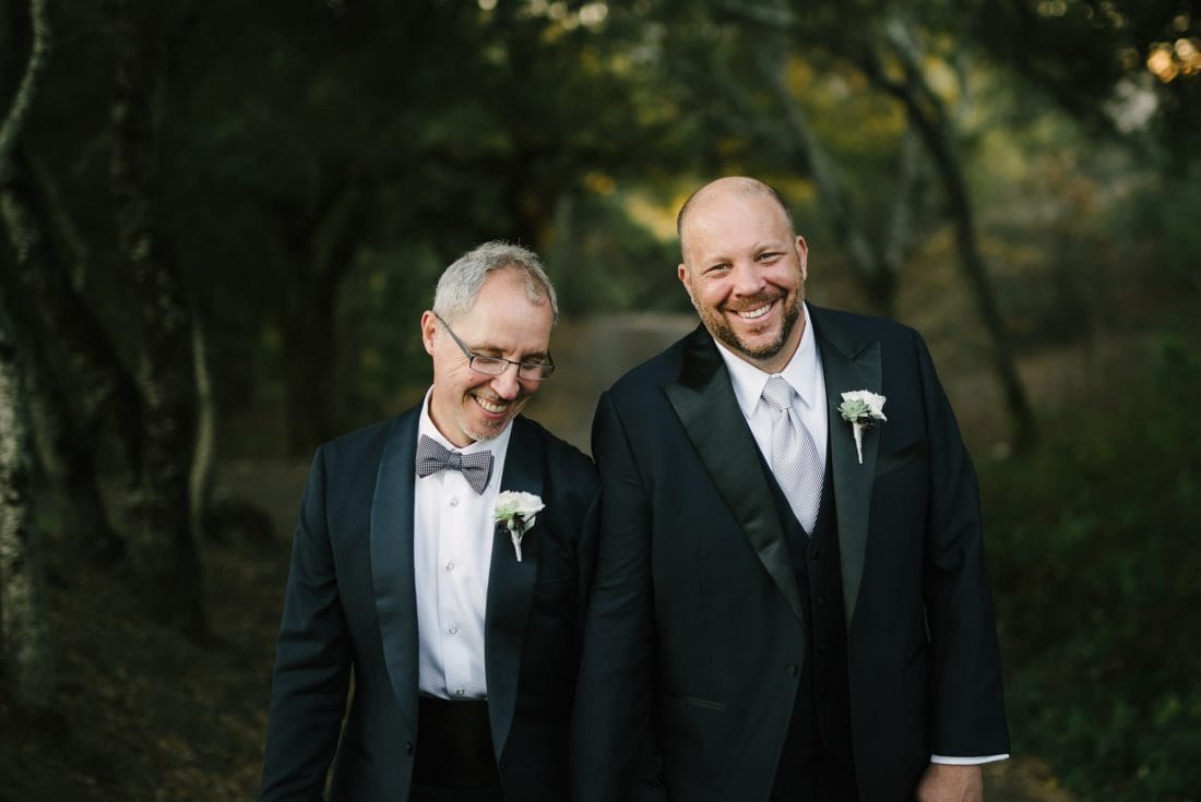 Gay Couple Laughing at Wedding