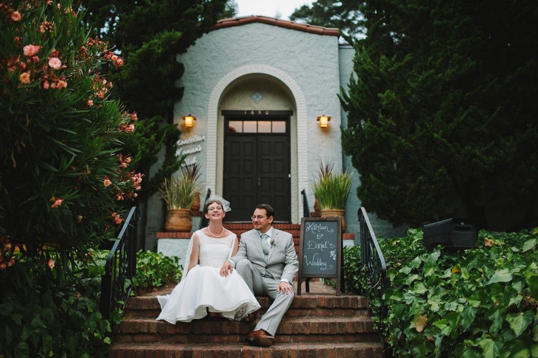 Fun Oakland Wedding couple on brick steps