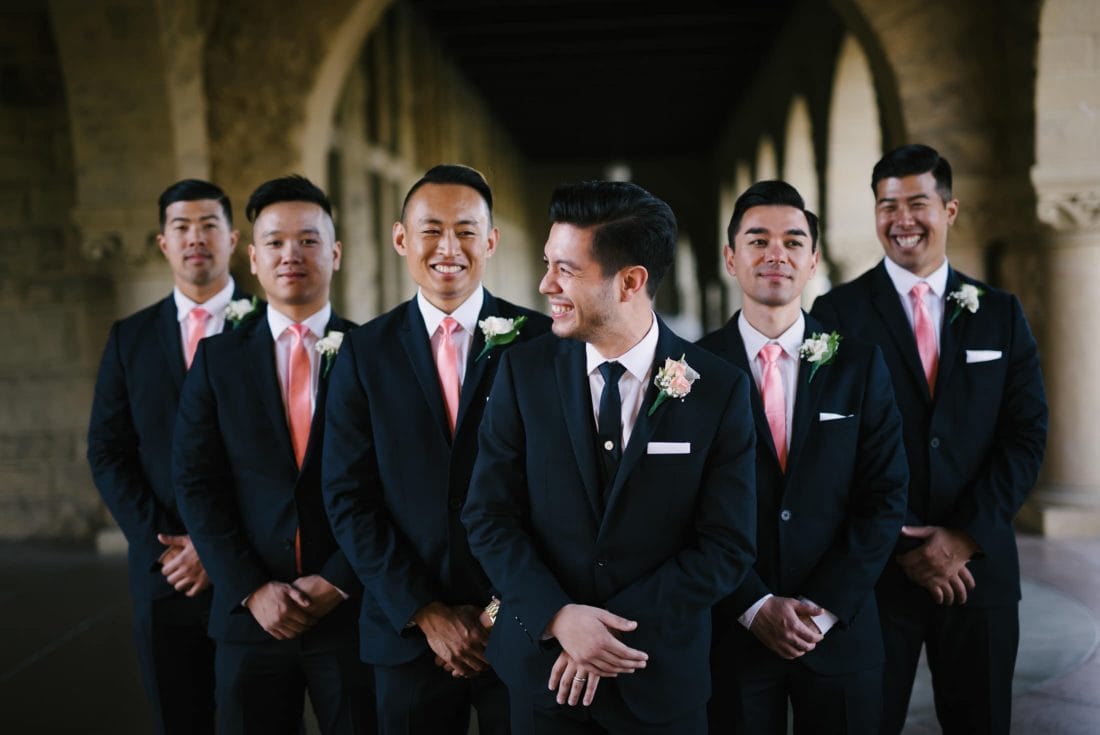 groom and groomsmen having fun at stanford wedding